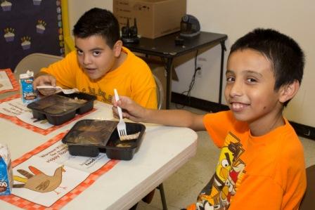 Boy Eating on Placemat.jpg