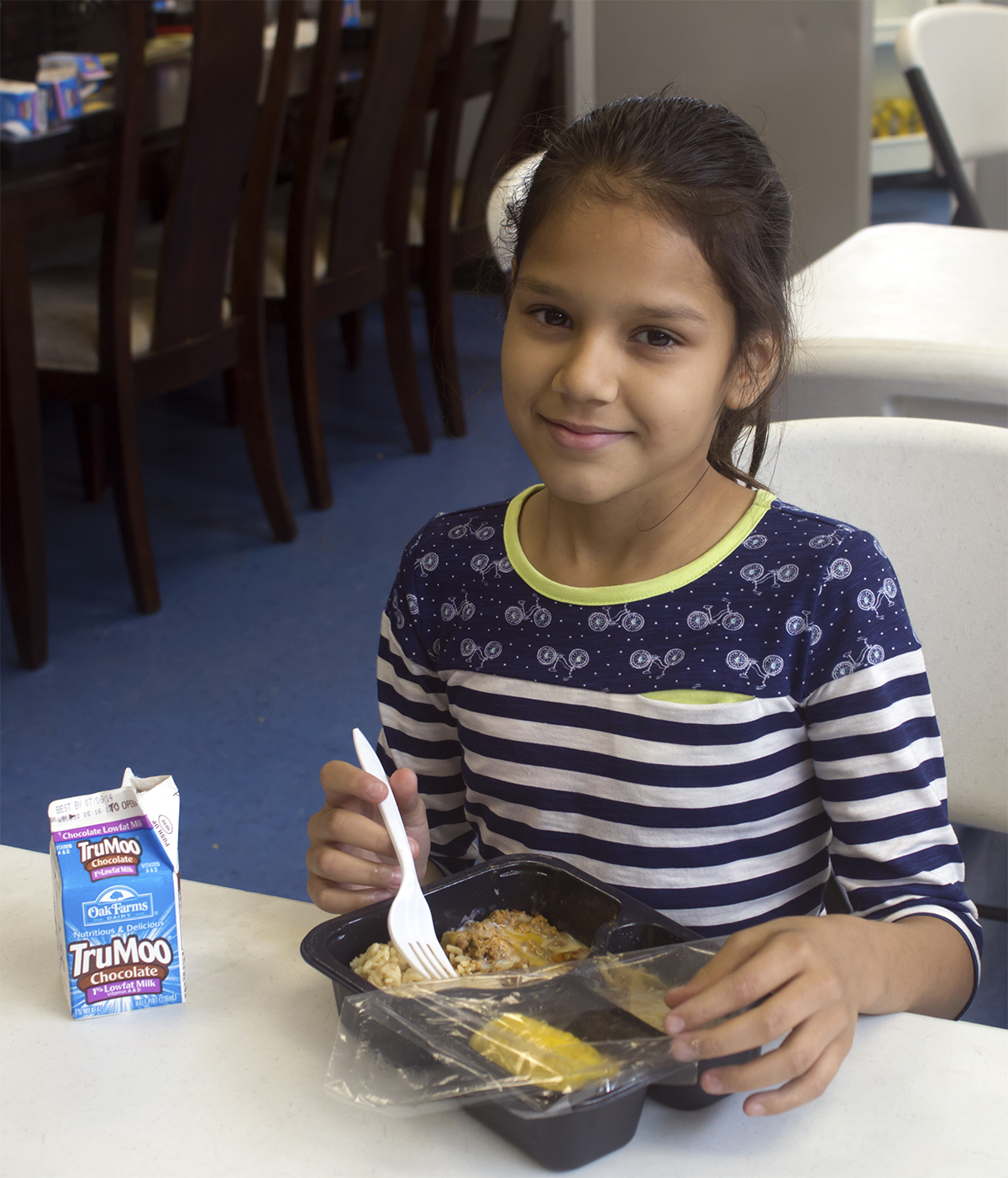 Girl Smiling with Food